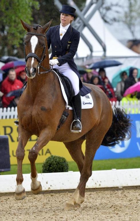 Nadine Capellmann avec le Württemberger Girasol, au Grand Prix Freestyle du CDI 5* de München-Riem, 2013 - CC BY 2.0 -  World Dressage Masters / Maximilian Schreiner 