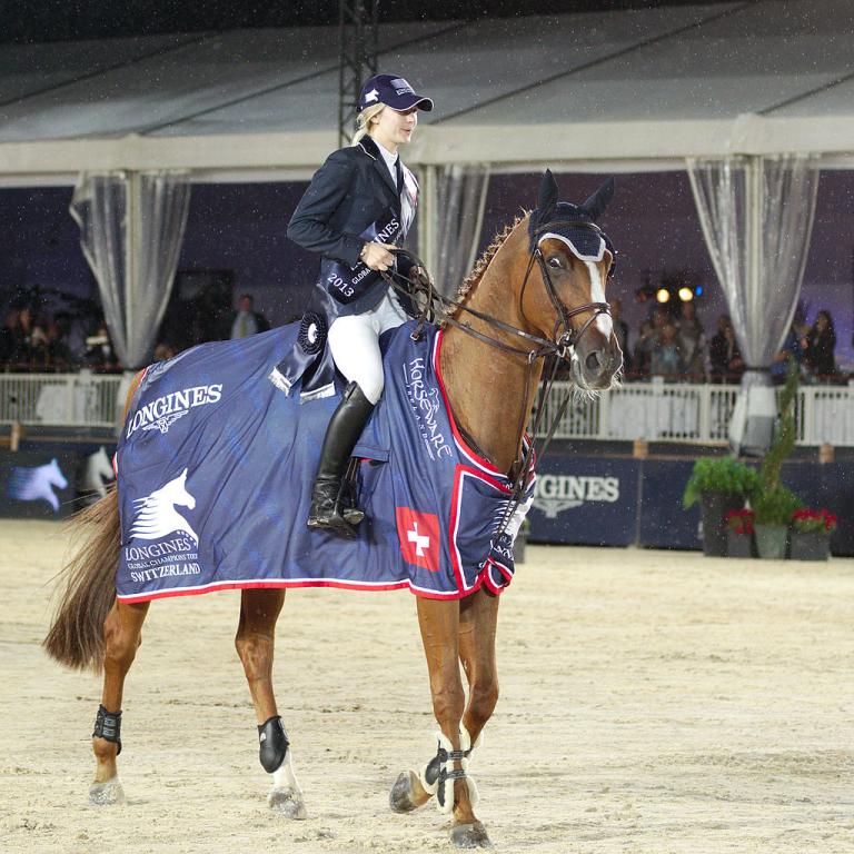  Barron and his rider Lucy Davis during the victory lap of the Longines Global Champions Tour event in Lausanne in 2013. - CC BY-SA 3.0 - Clément Bucco-Lechat